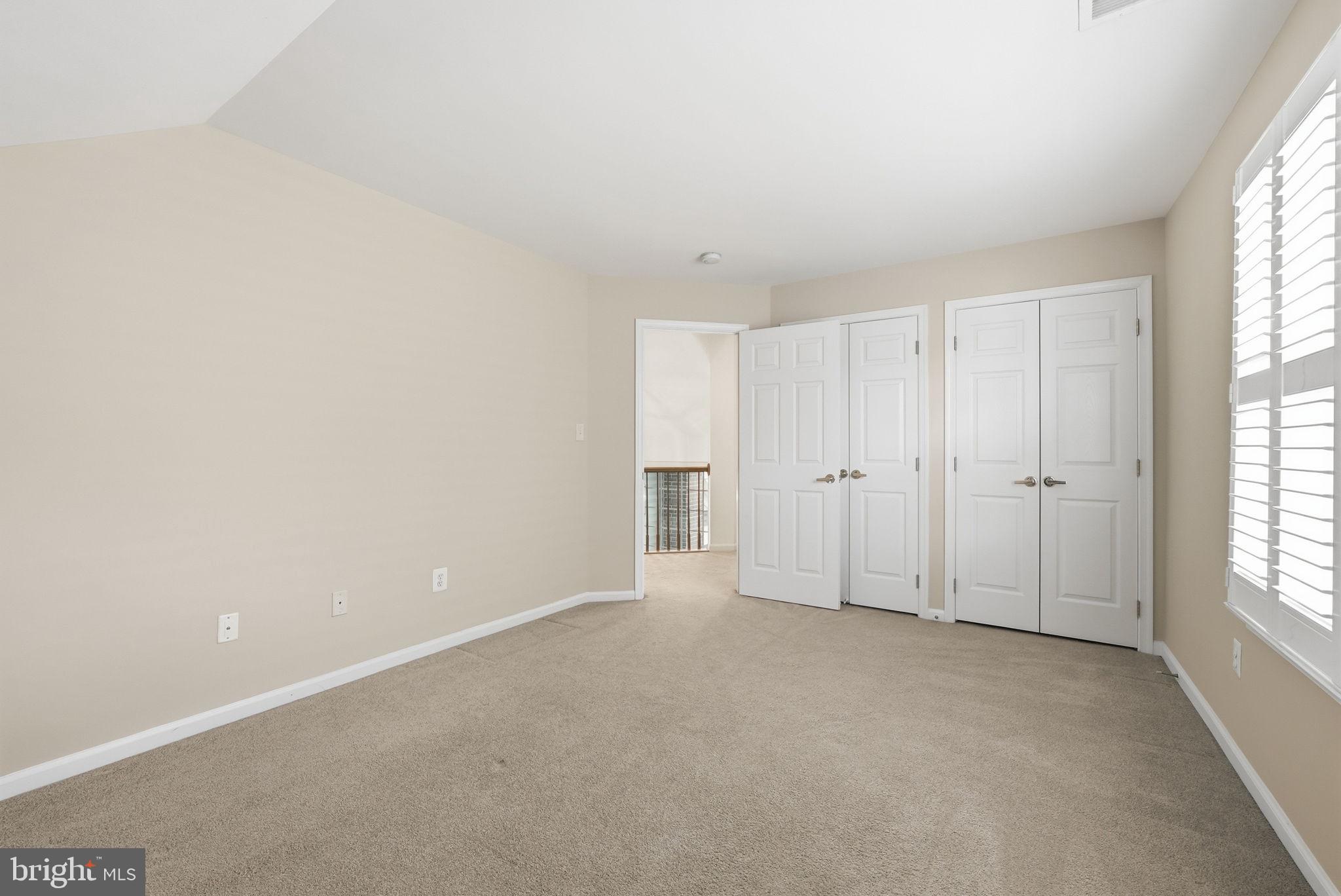 6828 Derby Run Way Gainesville, VA 20155 - Photo 24 of 30 Spacious room with natural light.