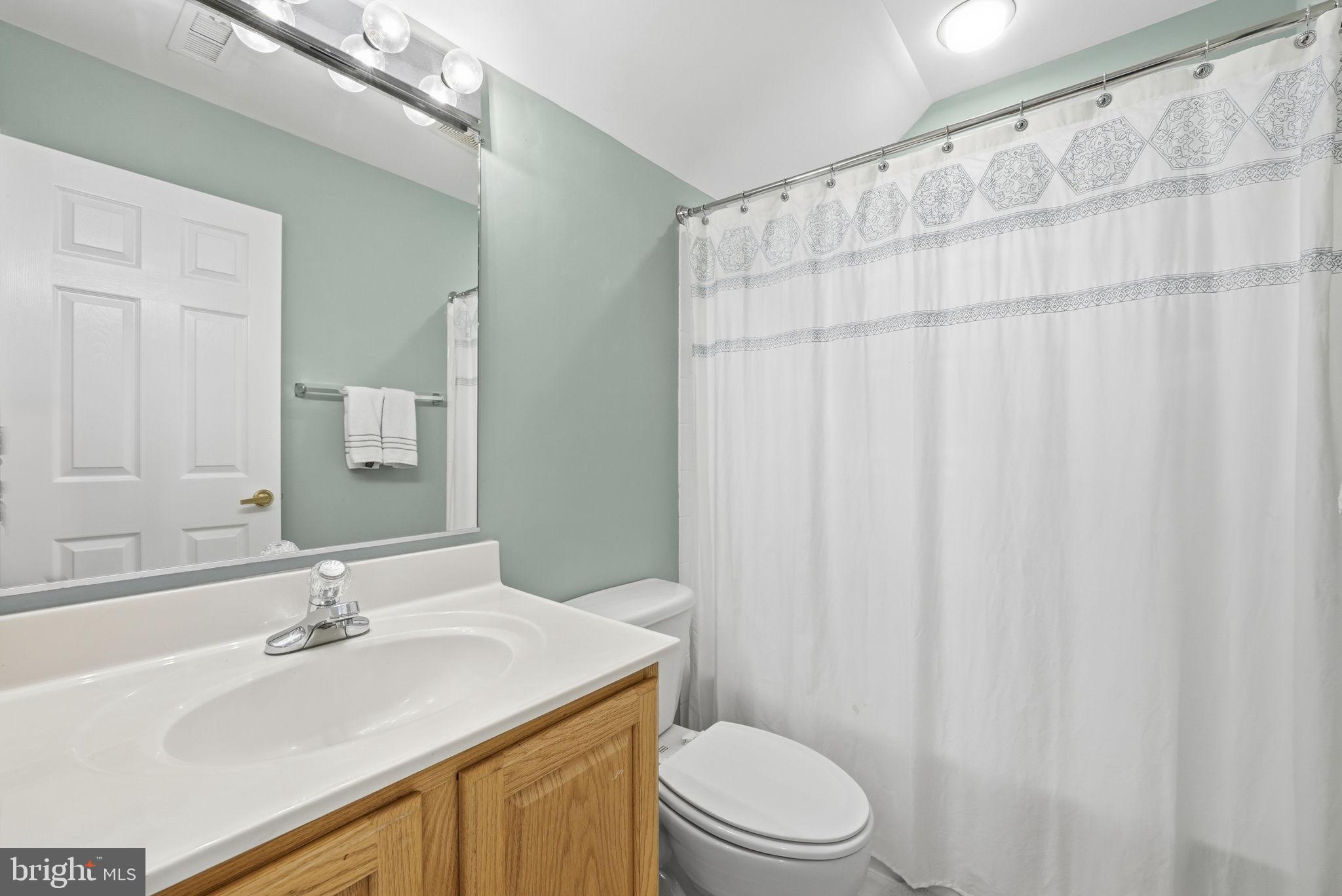 6828 Derby Run Way Gainesville, VA 20155 - Photo 26 of 30 Serene bathroom with modern touches.
