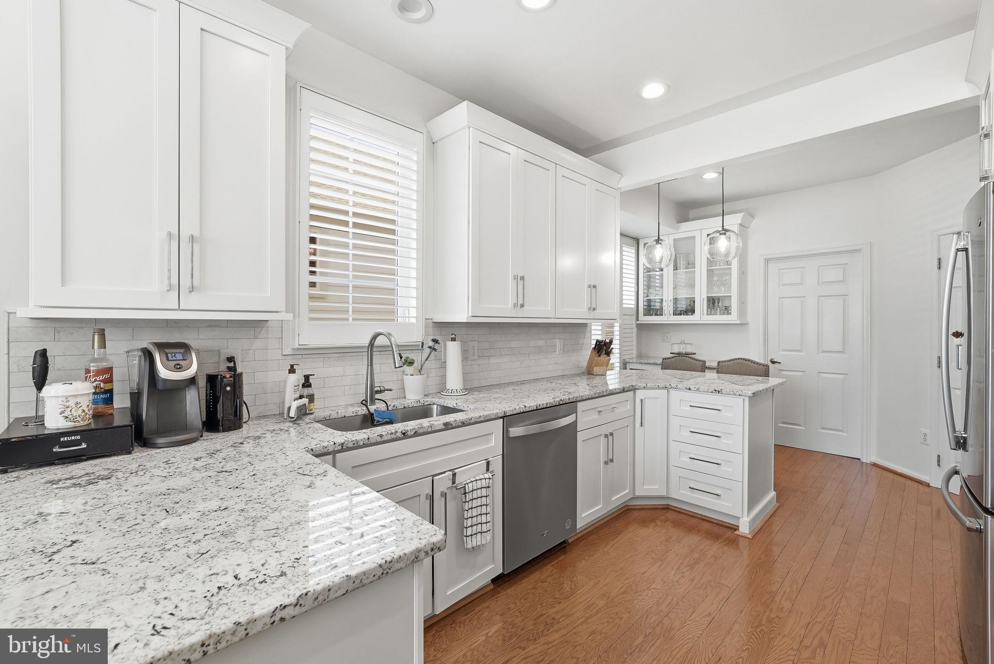 6828 Derby Run Way Gainesville, VA 20155 - Photo 5 of 30 Modern kitchen with sleek finishes.