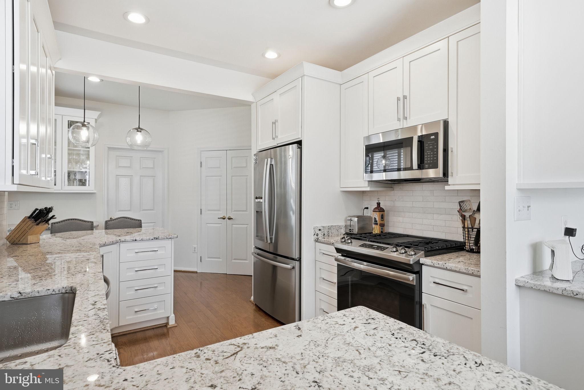 6828 Derby Run Way Gainesville, VA 20155 - Photo 6 of 30 Modern kitchen with sleek finishes.