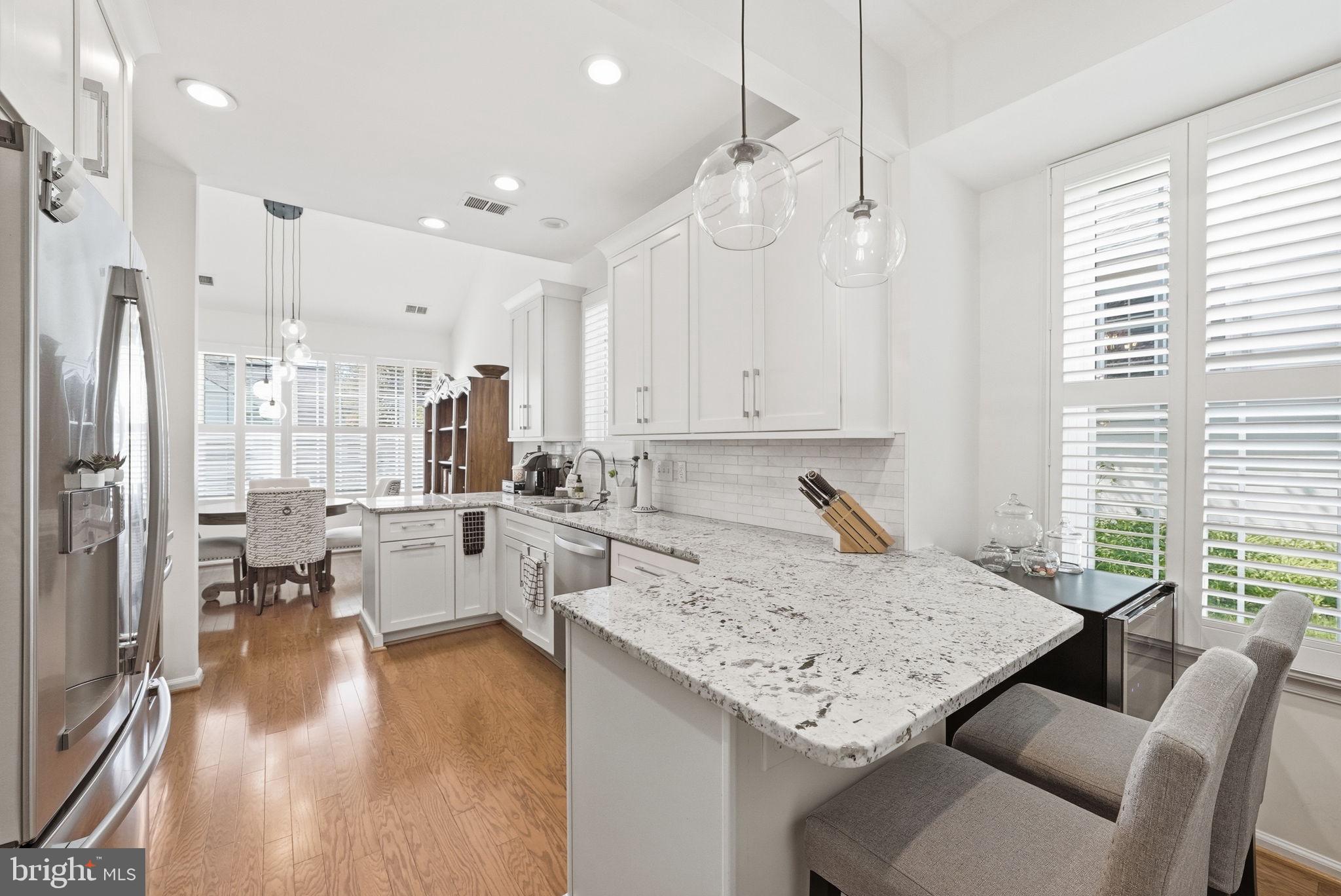6828 Derby Run Way Gainesville, VA 20155 - Photo 7 of 30 Modern kitchen with elegant finishes.