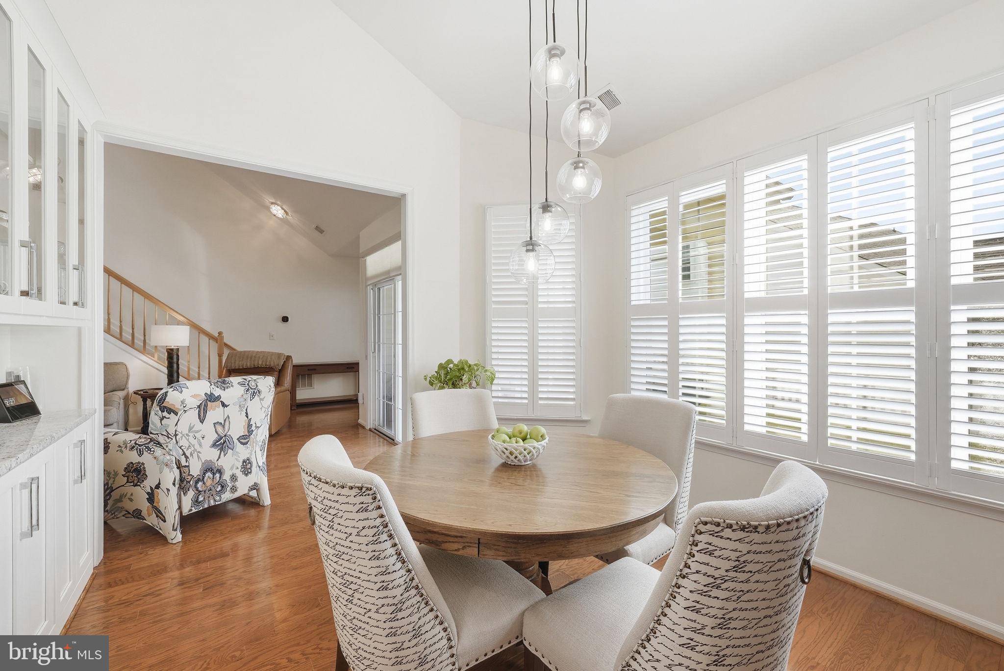 6828 Derby Run Way Gainesville, VA 20155 - Photo 8 of 30 Bright dining space with elegant charm.