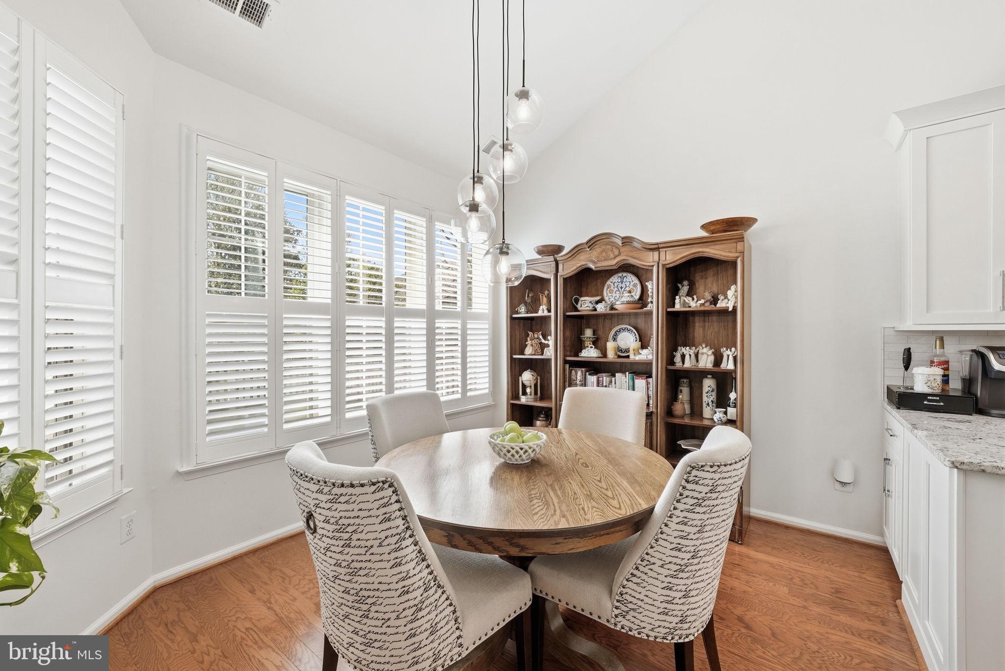 6828 Derby Run Way Gainesville, VA 20155 - Photo 9 of 30 Bright dining nook with elegant charm.