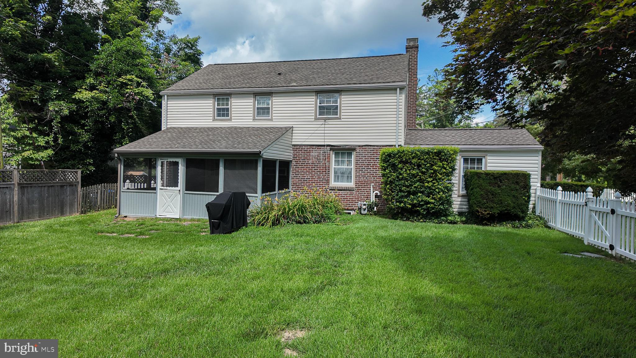1287 Huntingdon Road Abington, PA 19001 - Photo 35 of 38 a view of a house with a yard and plants