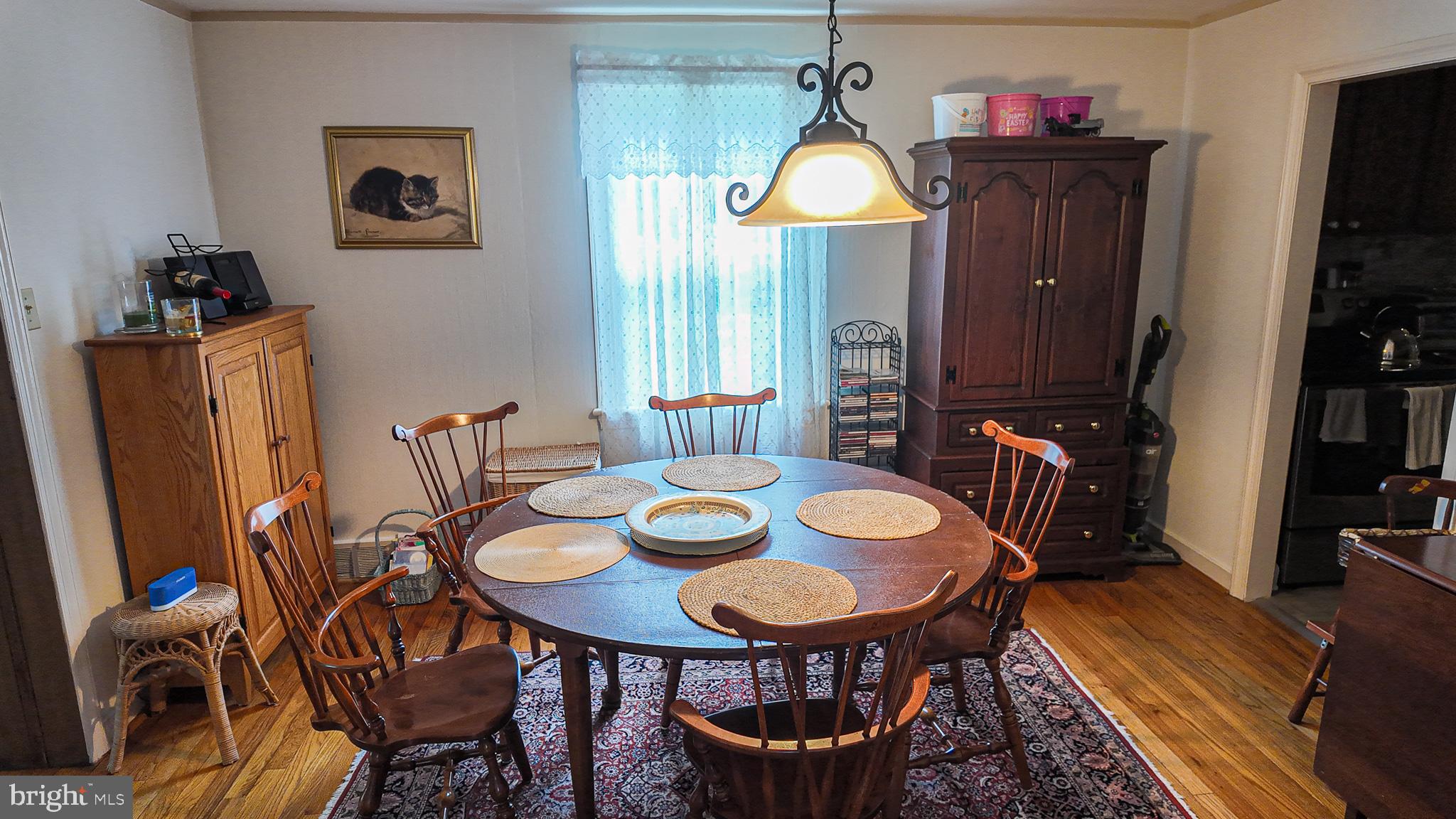 1287 Huntingdon Road Abington, PA 19001 - Photo 8 of 38 a view of a dining room with furniture and wooden floor