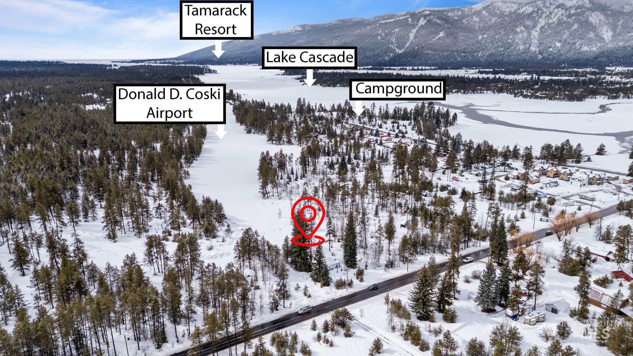 881 West Roseberry Road Donnelly, ID 83615 - Photo 12 of 24 Snowy aerial view with a mountain view