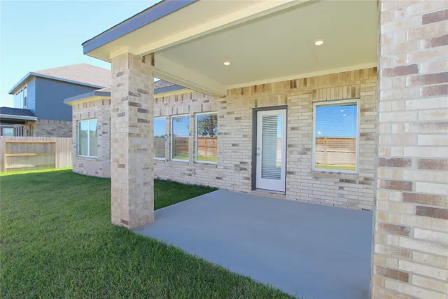 a view of a bathroom with a shower and a sink