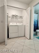 6039 Ellerston Way Avenue, Unit 2017 Immokalee, FL 34142 - Photo 21 of 34 a bathroom with a granite countertop sink a mirror and a shower