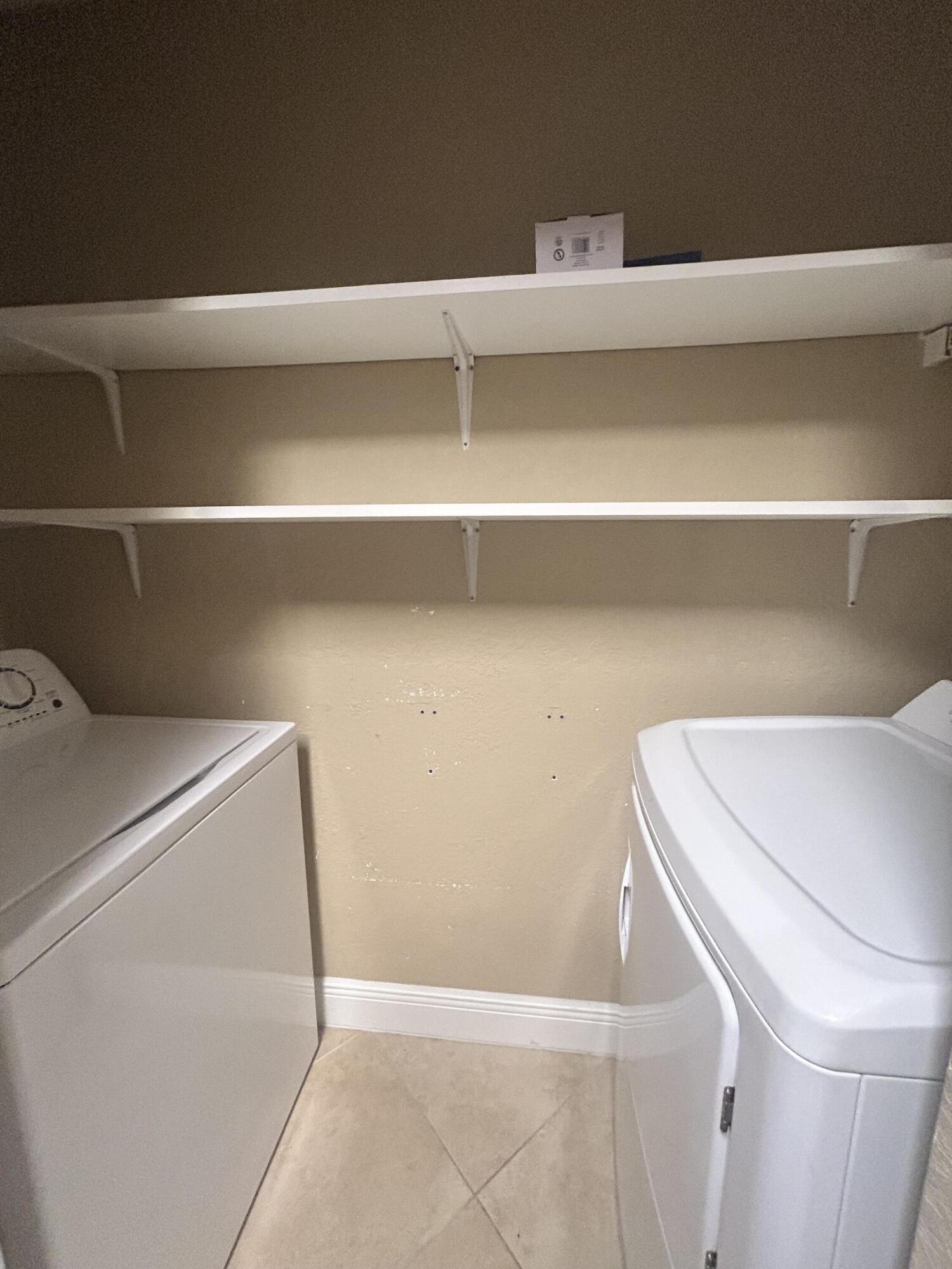 1660 Renaissance Commons Boulevard, Unit 2111 Boynton Beach, FL 33426 - Photo 9 of 16 Laundry
