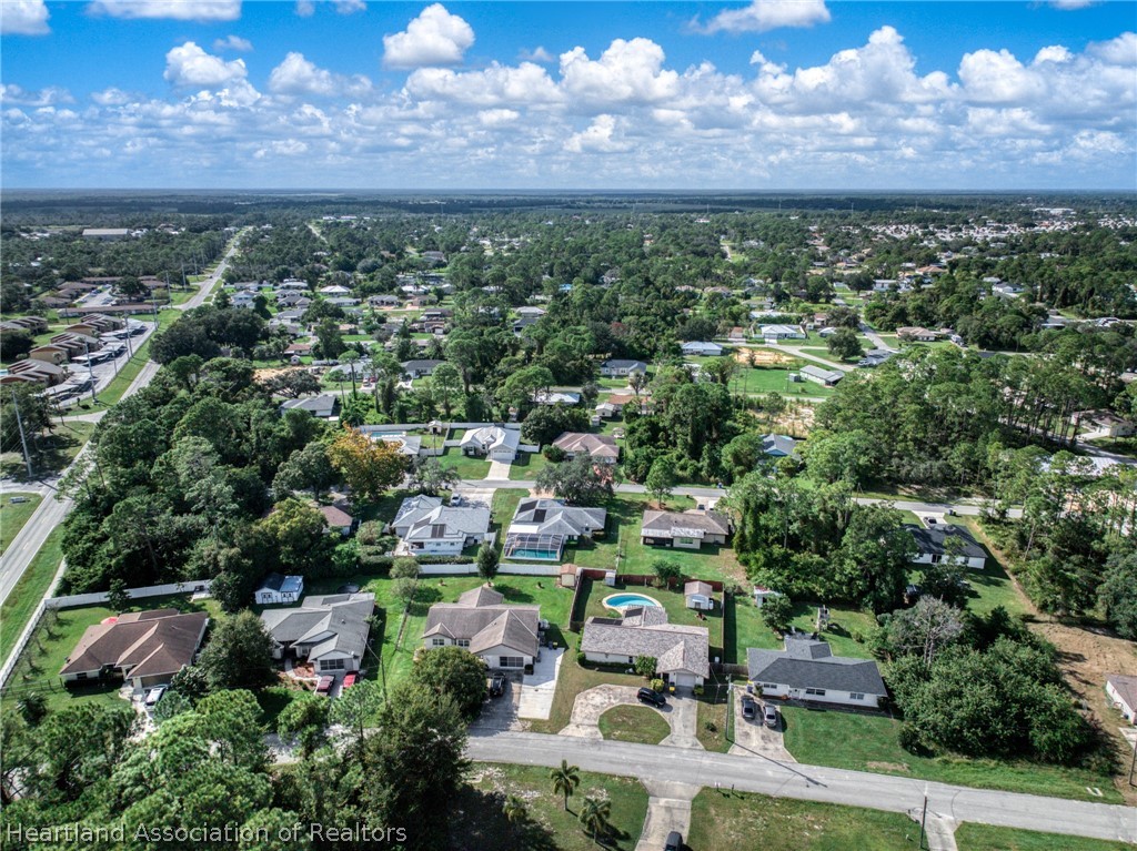 3308 Thunderbird Road Sebring, FL 33872 - Photo 6 of 6 a view of a city with a sitting area