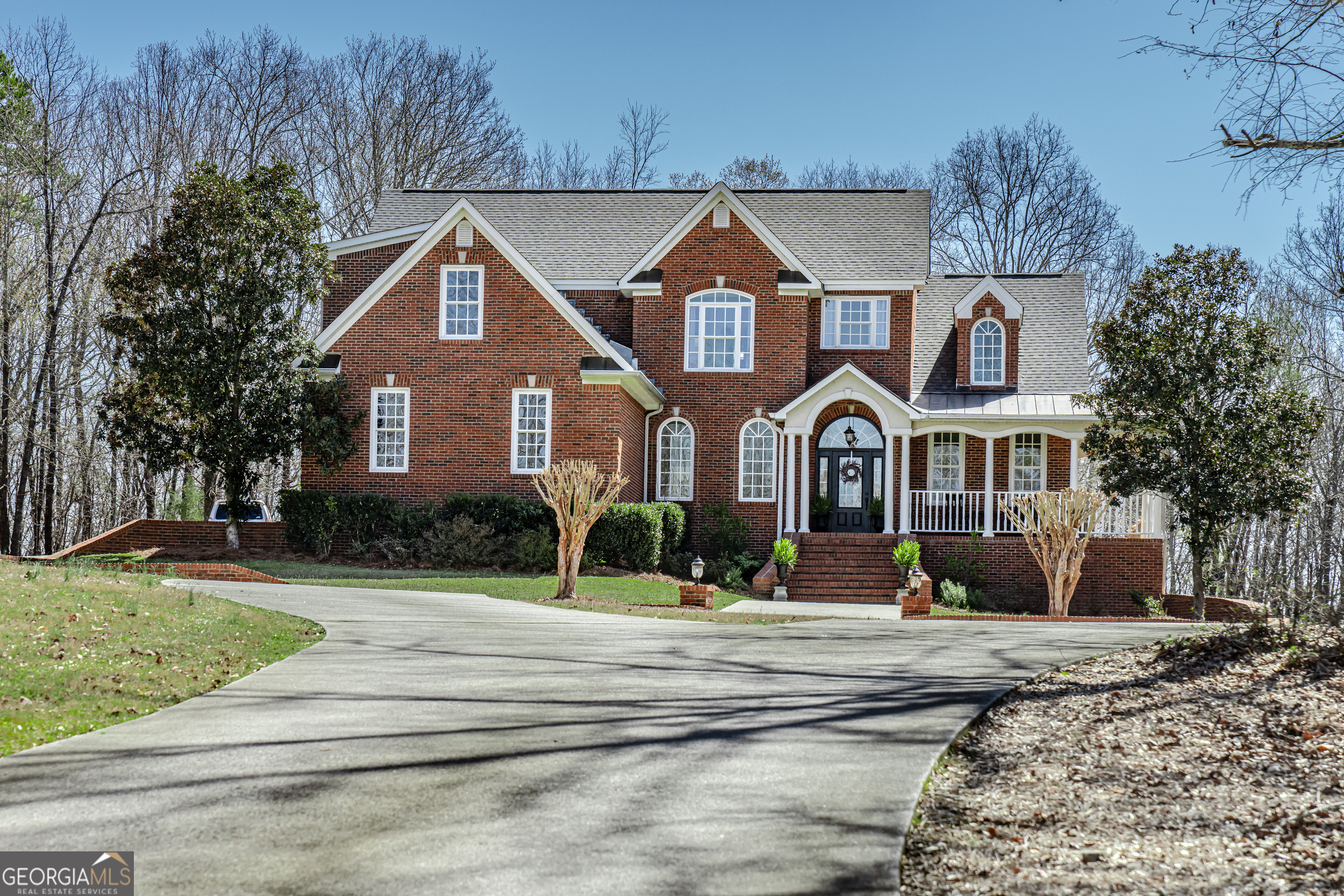 266 Rustic Ridge Road Northeast Rome, GA 30161 - Photo 1 of 1 a front view of a house with a yard