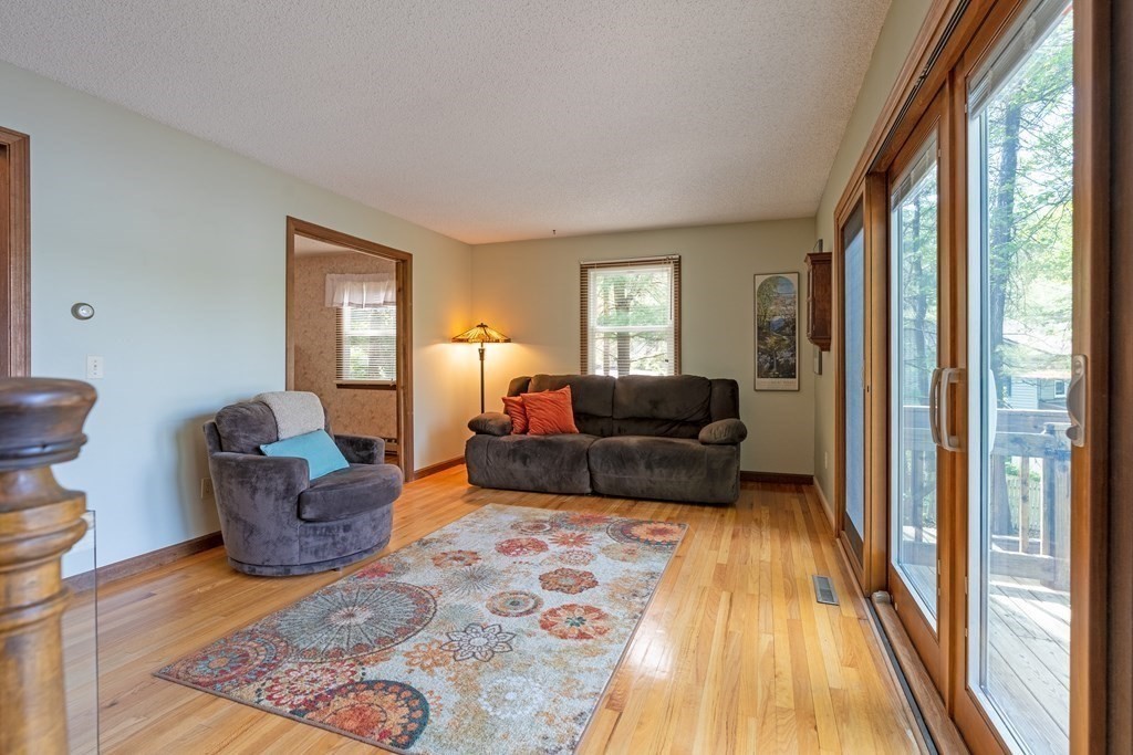73 Beaver Road Ware, MA 01082 - Photo 20 of 42 a living room with furniture and a rug