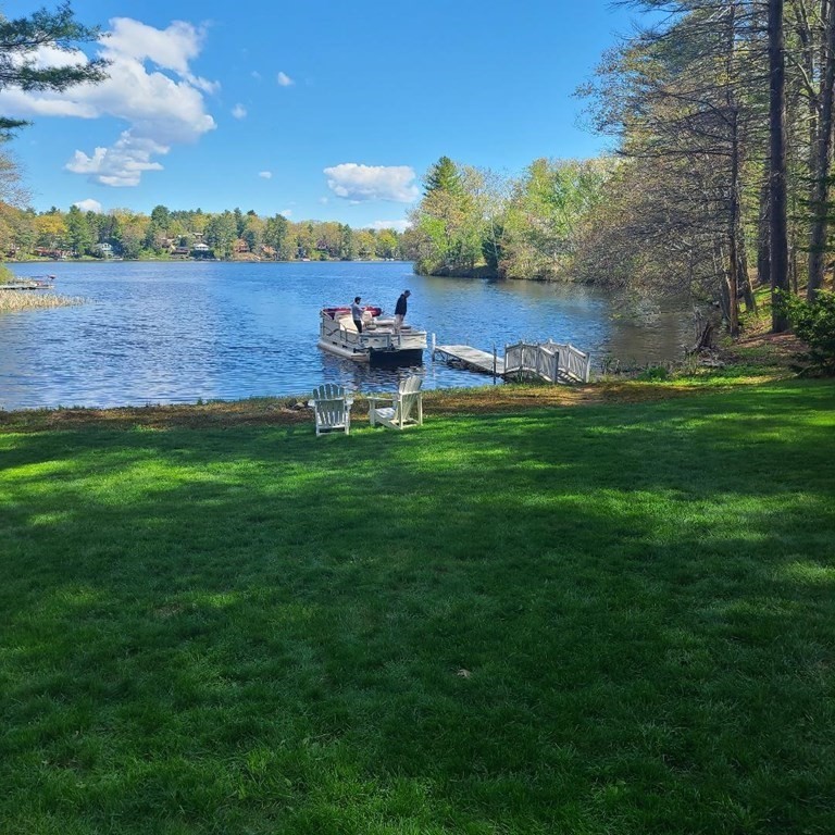 73 Beaver Road Ware, MA 01082 - Photo 6 of 42 a view of a lake from a yard