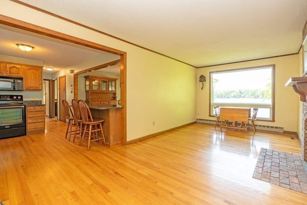 73 Beaver Road Ware, MA 01082 - Photo 9 of 42 a view of a livingroom with furniture and a flat screen tv