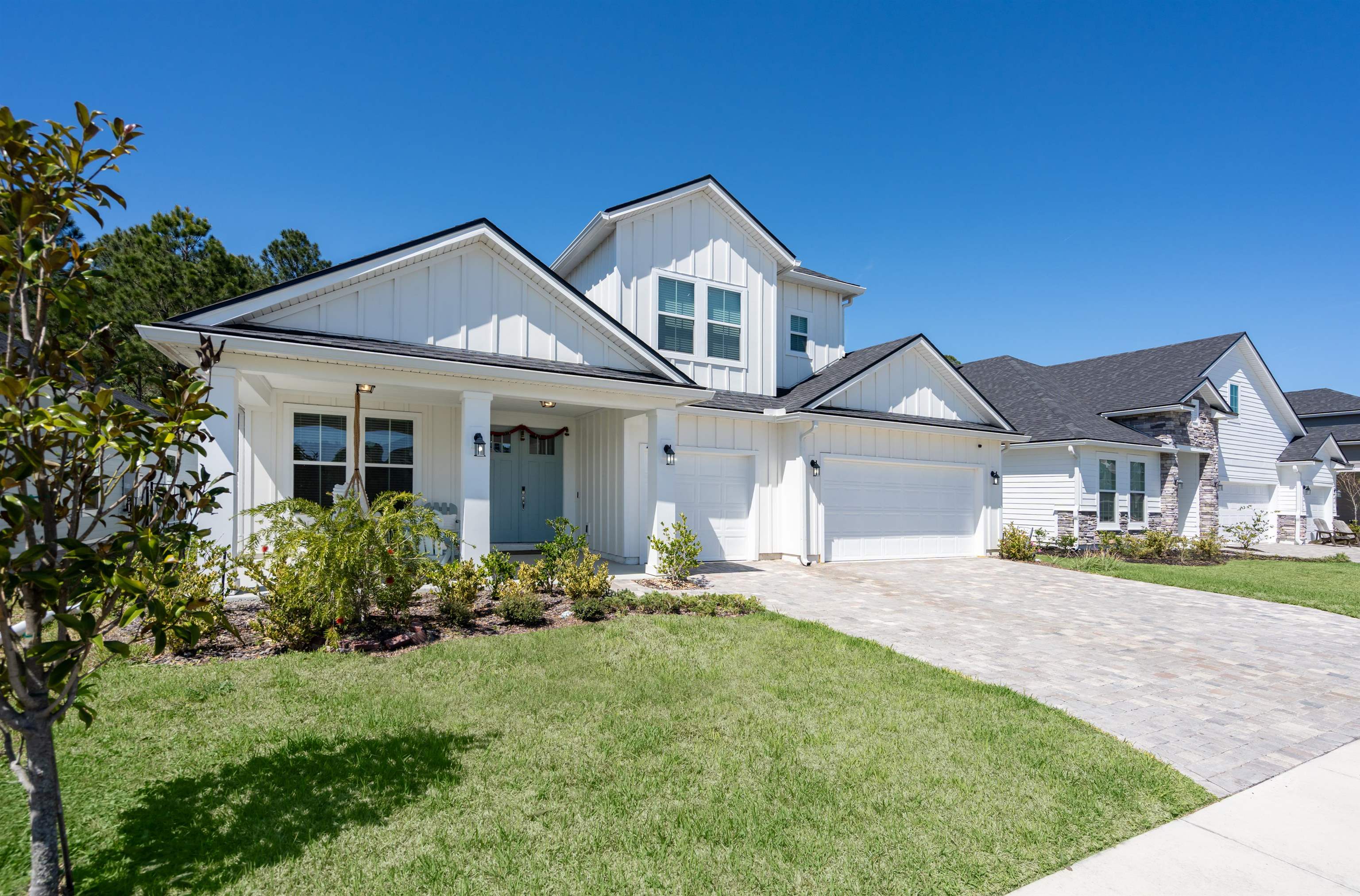 207 Archstone Way St. Augustine, FL 32092 - Photo 2 of 49 front view of a house with a yard
