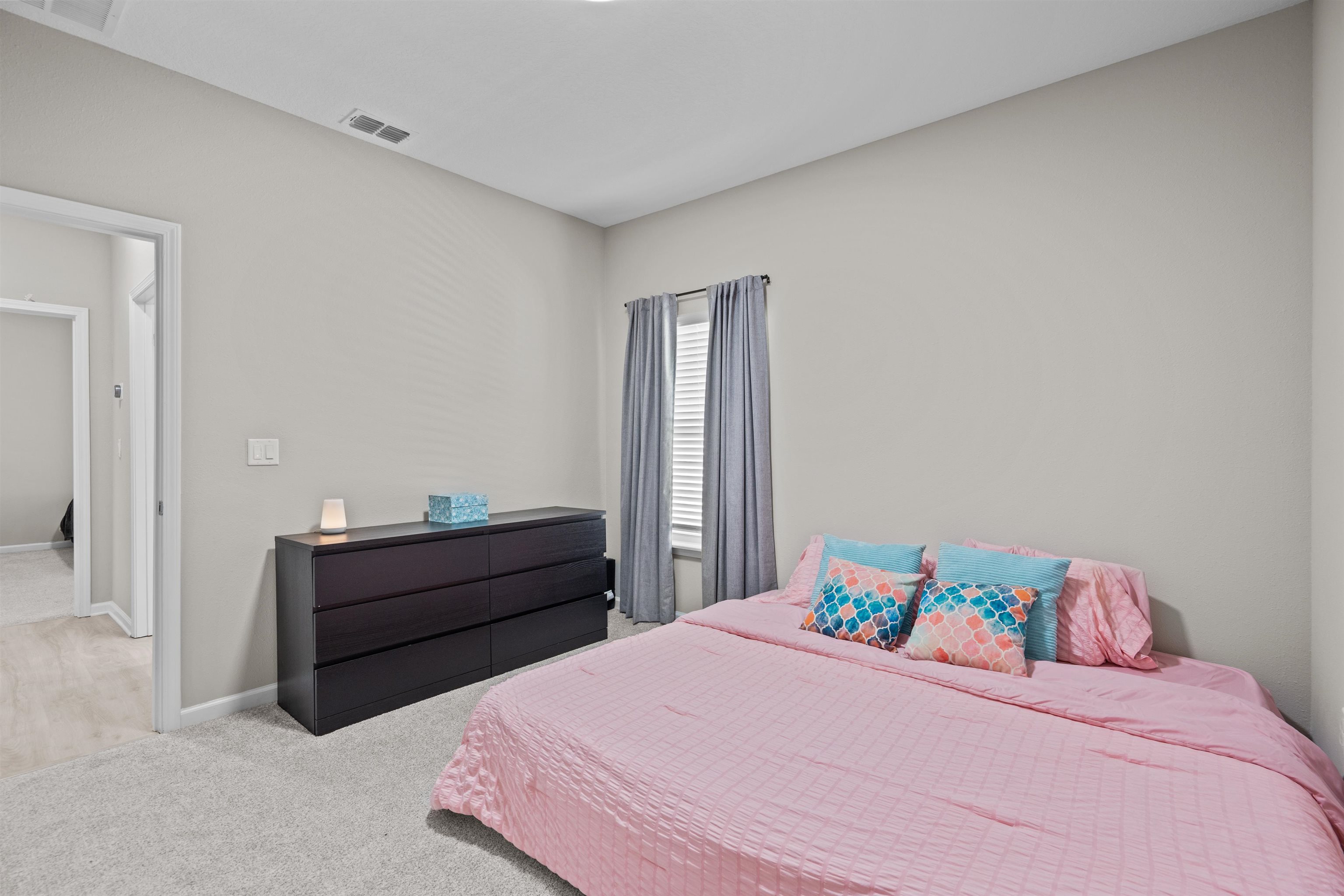 207 Archstone Way St. Augustine, FL 32092 - Photo 25 of 49 a bedroom with a bed and window