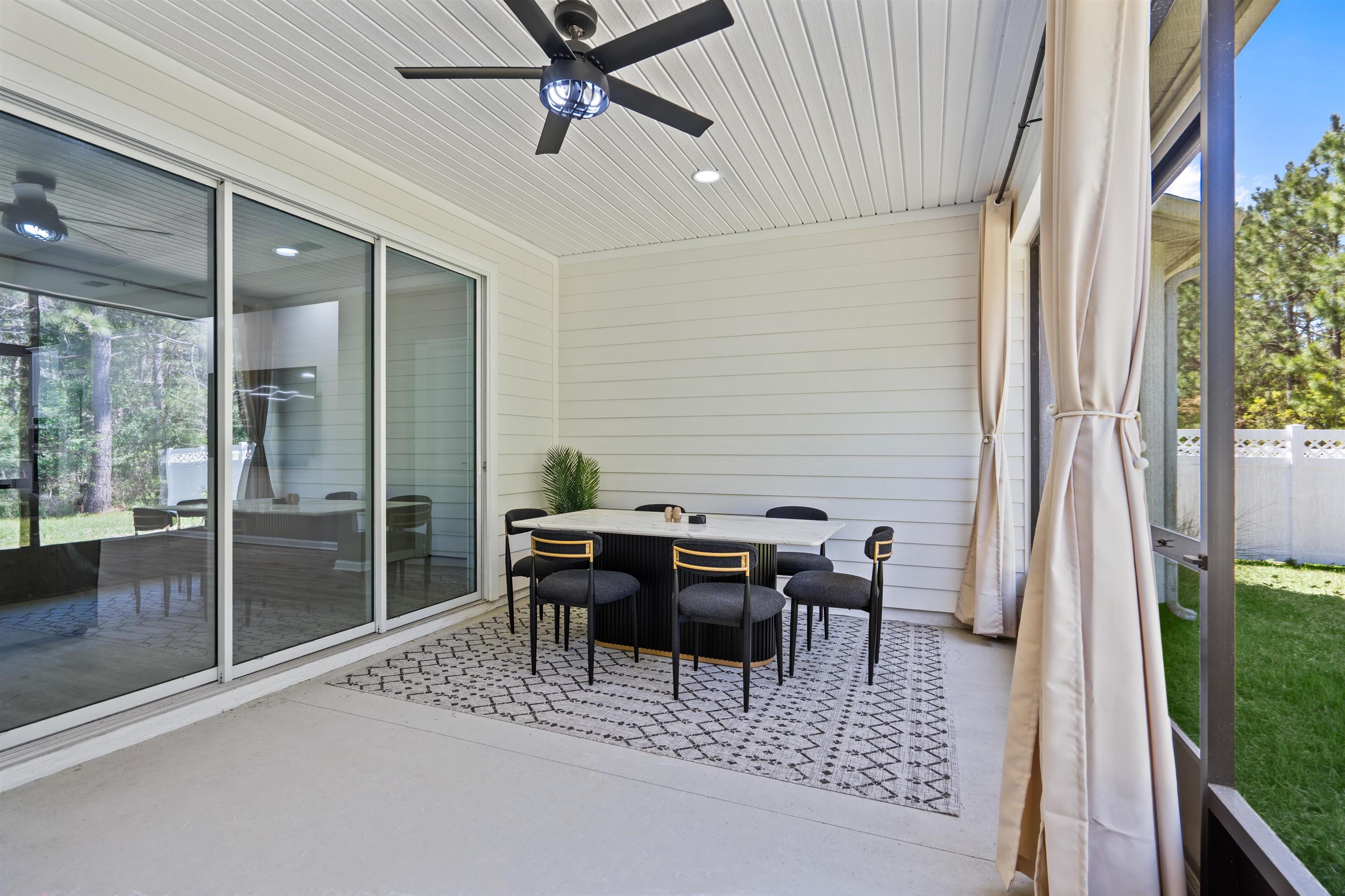 207 Archstone Way St. Augustine, FL 32092 - Photo 33 of 49 a view of a dining room with furniture window and wooden floor