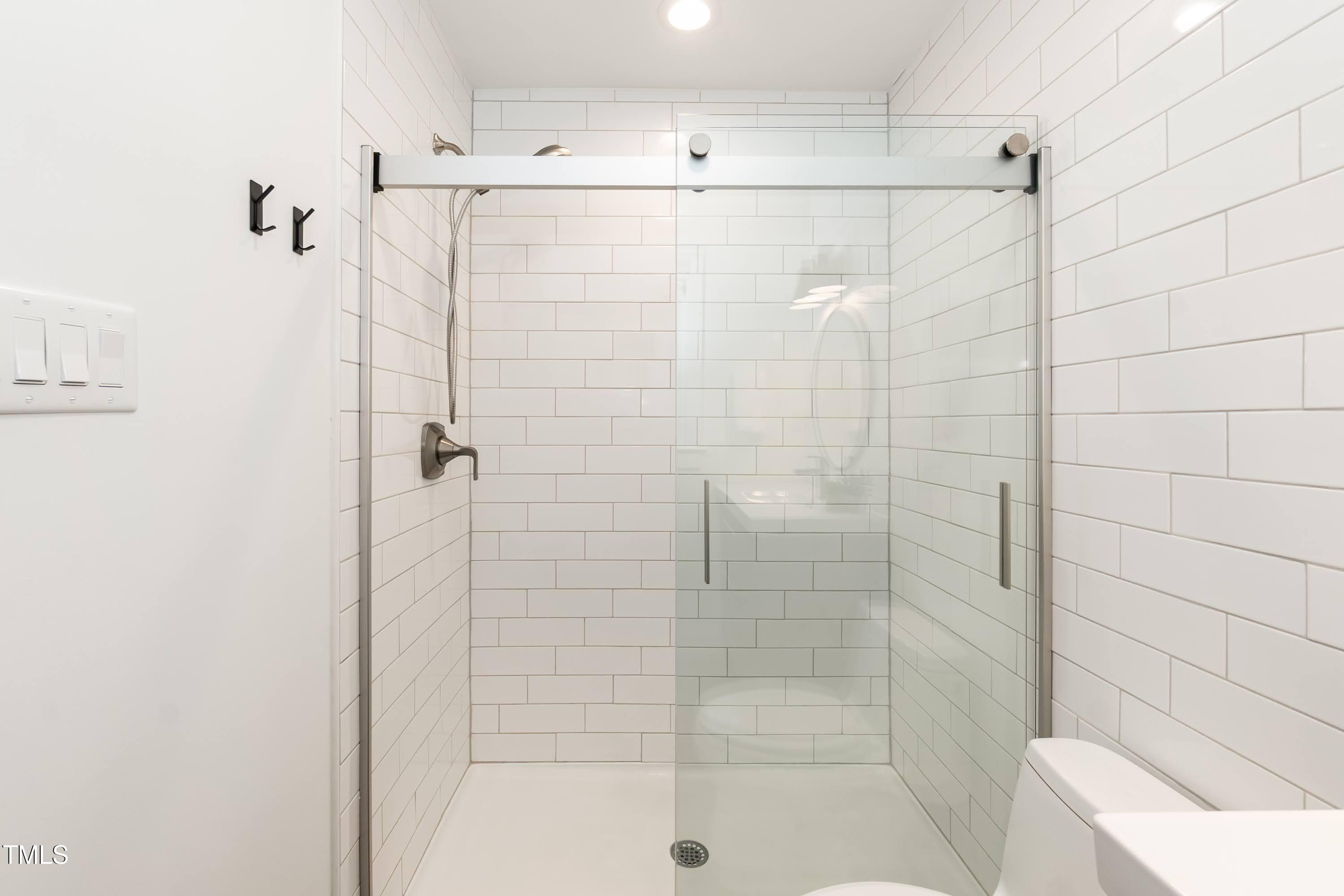 9024 Oneal Road Raleigh, NC 27613 - Photo 24 of 40 Update tile shower and glass doors