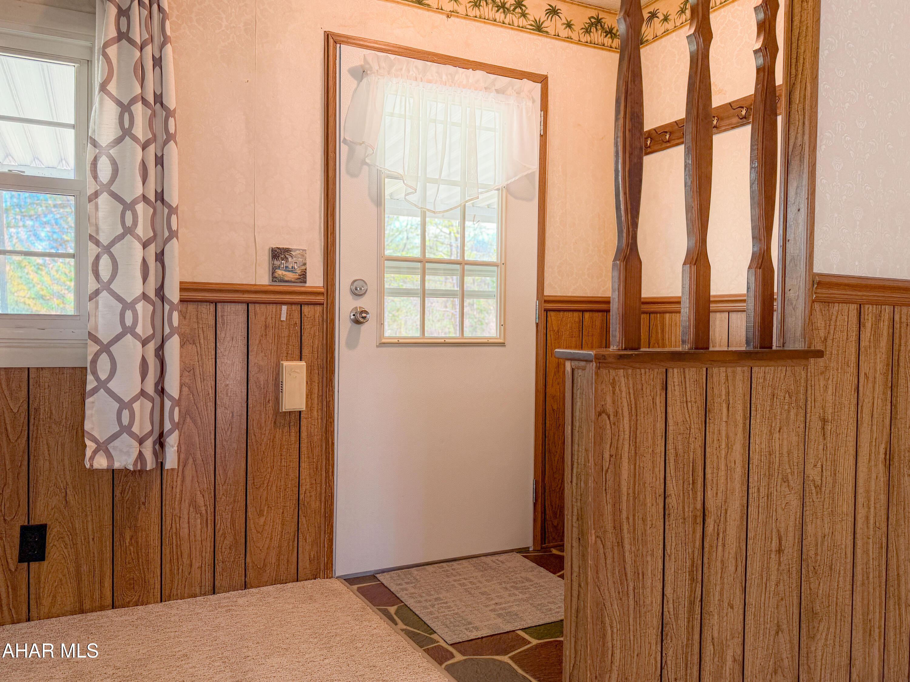 151 Pine Echo Road Everett, PA 15537 - Photo 17 of 51 a view of a bedroom with wooden floor and windows