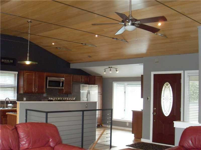 9600 Woodcrest Road Pittsburgh, PA 15237 - Photo 4 of 15 Kitchen. The vaulted ceiling features unique cable detailing that is repeated in the stair railing.