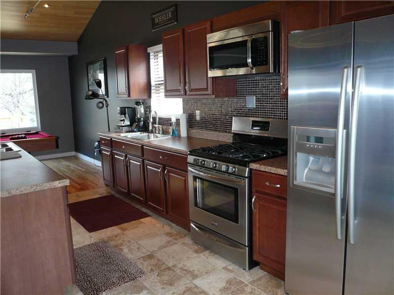 9600 Woodcrest Road Pittsburgh, PA 15237 - Photo 6 of 15 Kitchen. Stainless gas stove refrigerator, dishwasher, and wine cooler are included.