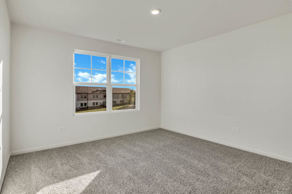 313 Snowdrop Lane Elgin, IL 60124 - Photo 13 of 61 a view of an empty room with a window