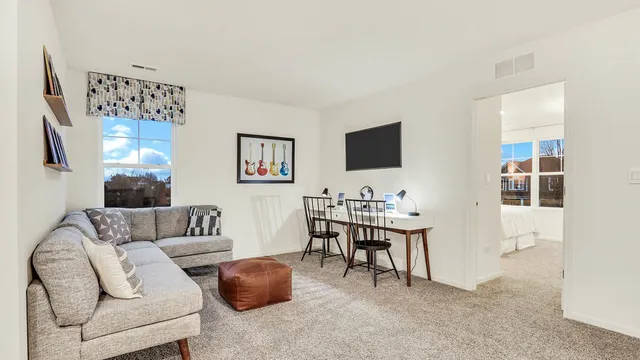 a bedroom with a bed and a cabinets