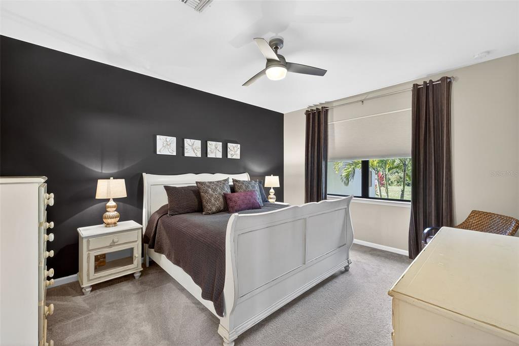 5821 Mayflower Way Ave Maria, FL 34142 - Photo 16 of 36 a bed room with a bed and a window