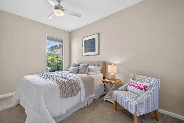 a bedroom with a bed and a couch