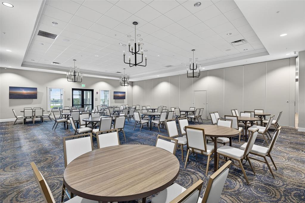 5821 Mayflower Way Ave Maria, FL 34142 - Photo 28 of 36 a view of a dining room with furniture