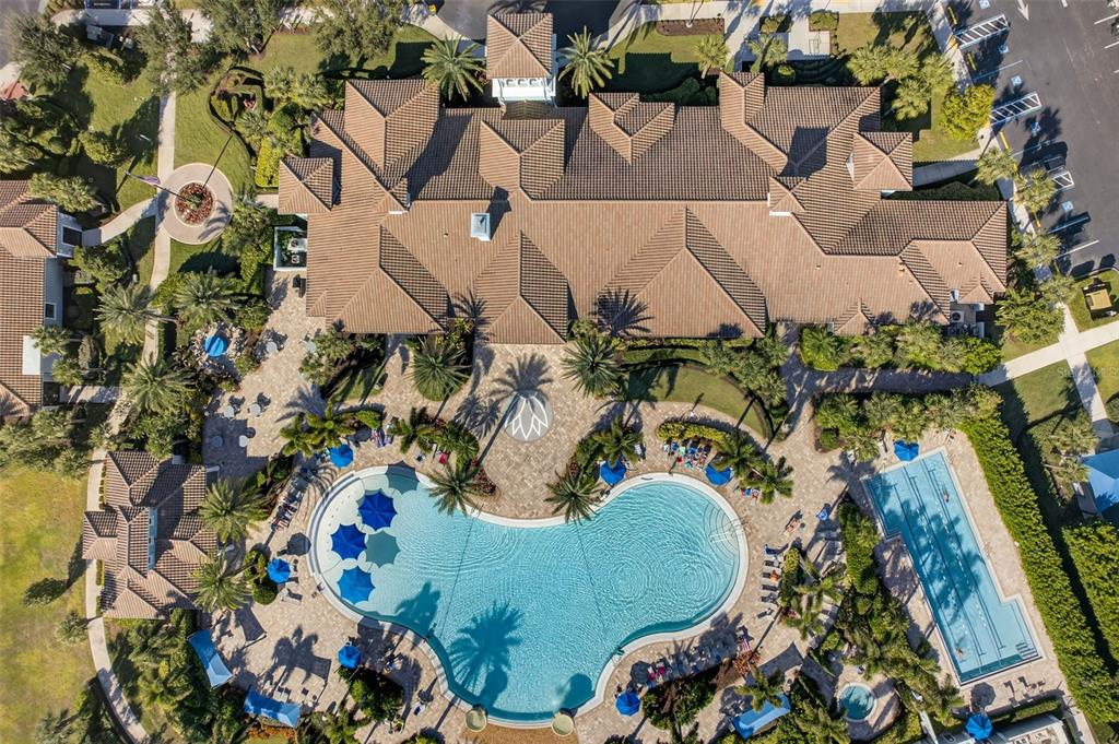 5821 Mayflower Way Ave Maria, FL 34142 - Photo 32 of 36 an aerial view of a house with a yard and garden