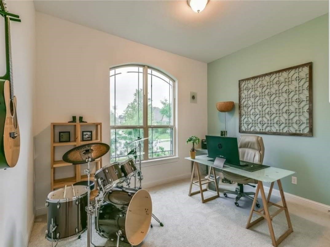 13326 Lake Chesdin Road Houston, TX 77044 - Photo 18 of 23 a view of a livingroom with furniture and a window
