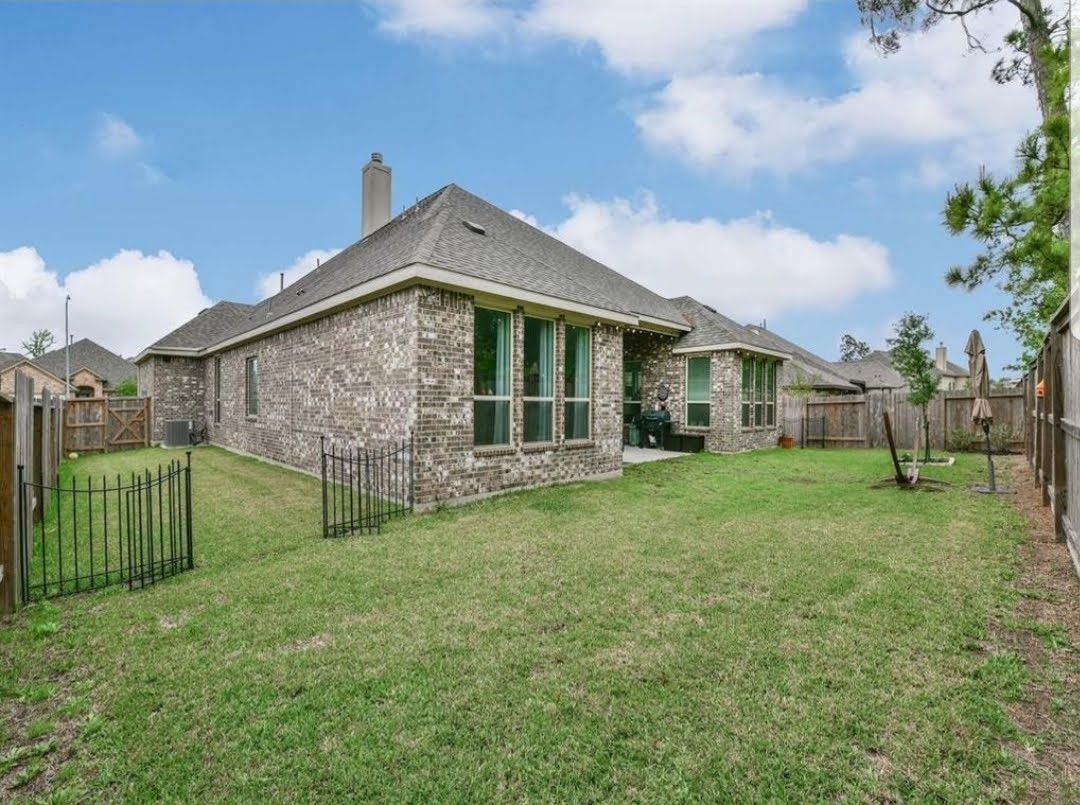 13326 Lake Chesdin Road Houston, TX 77044 - Photo 23 of 23 a view of a house with backyard and garden