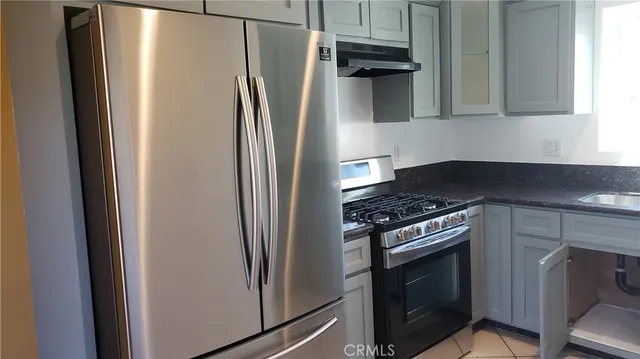 a view of hallway with wooden floor