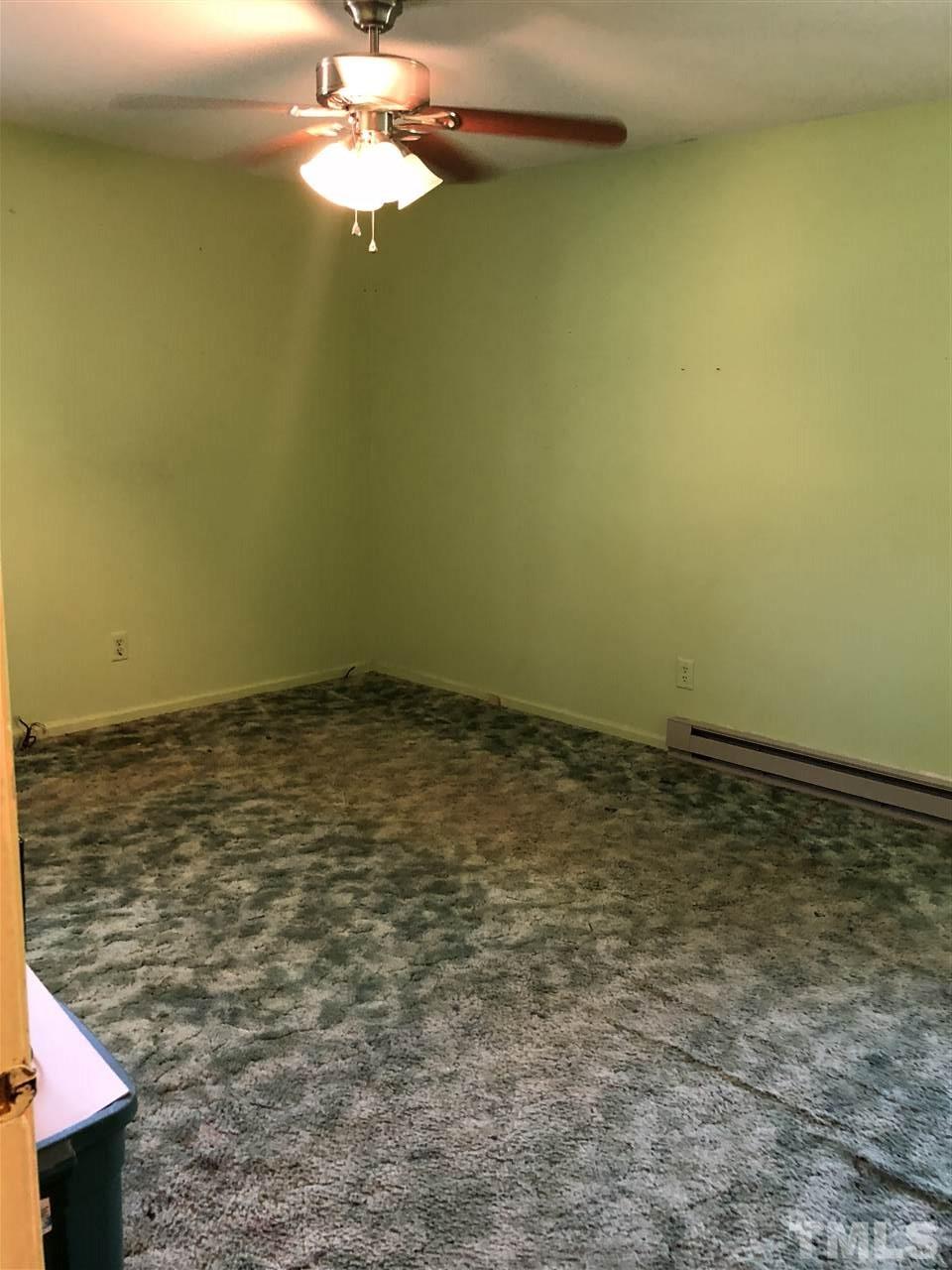 956 Fire Lane Road Bunnlevel, NC 28323 - Photo 11 of 16 a view of a room with a sink and chandelier fan