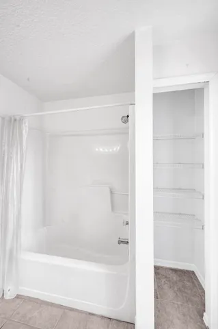 a bathroom with a bathtub