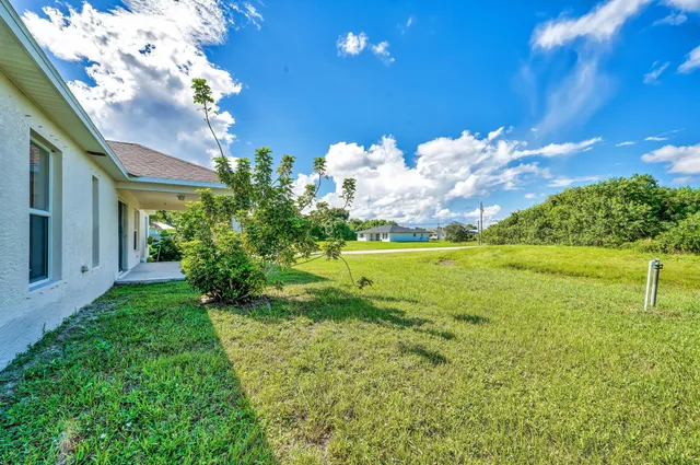 a view of a house with a big yard