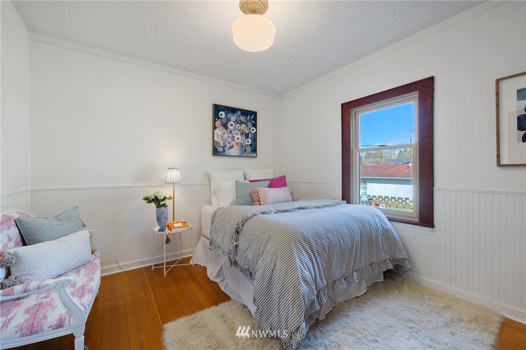 1614 Oakes Avenue Everett, WA 98201 - Photo 12 of 26 a bedroom with a bed and a window