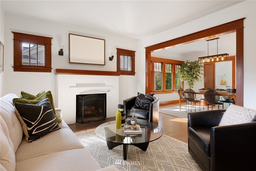 1614 Oakes Avenue Everett, WA 98201 - Photo 3 of 26 a living room with furniture a fireplace and a large window
