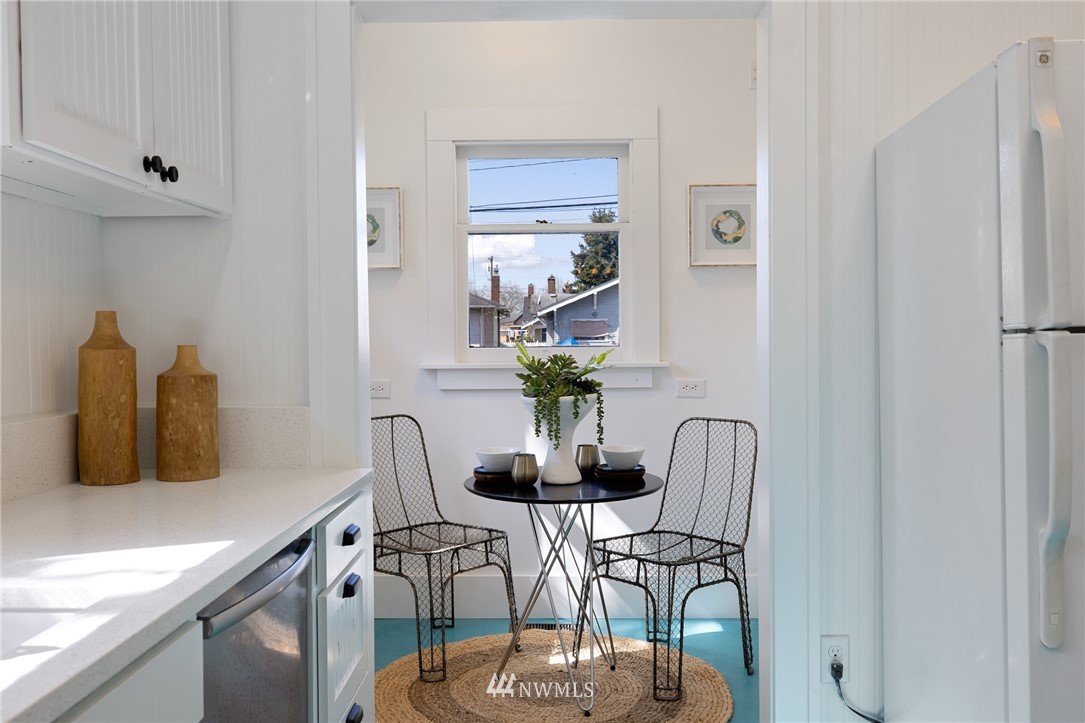 1614 Oakes Avenue Everett, WA 98201 - Photo 6 of 26 a dining room with furniture and wooden floor