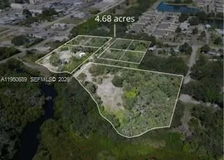 an aerial view of a residential houses
