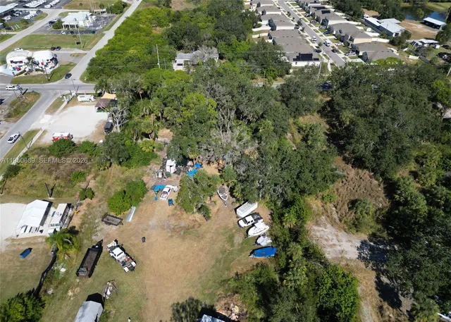 an aerial view of residential house with outdoor space