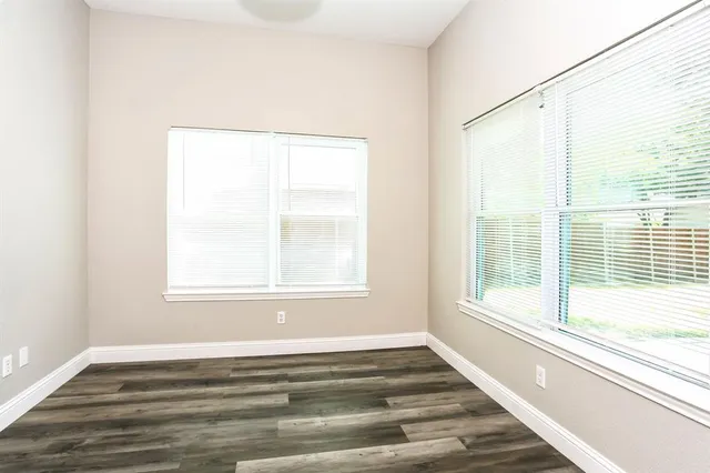 a view of a room that has a window in it