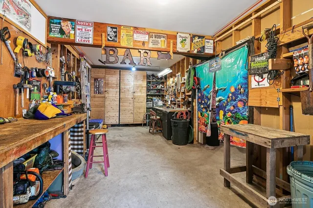 an outdoor sitting area with shower and couch