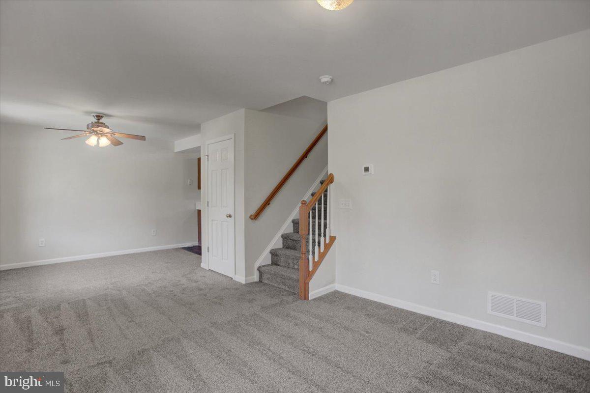 604 Fairview Avenue Waynesboro, PA 17268 - Photo 5 of 30 Spacious living area with inviting stairs.