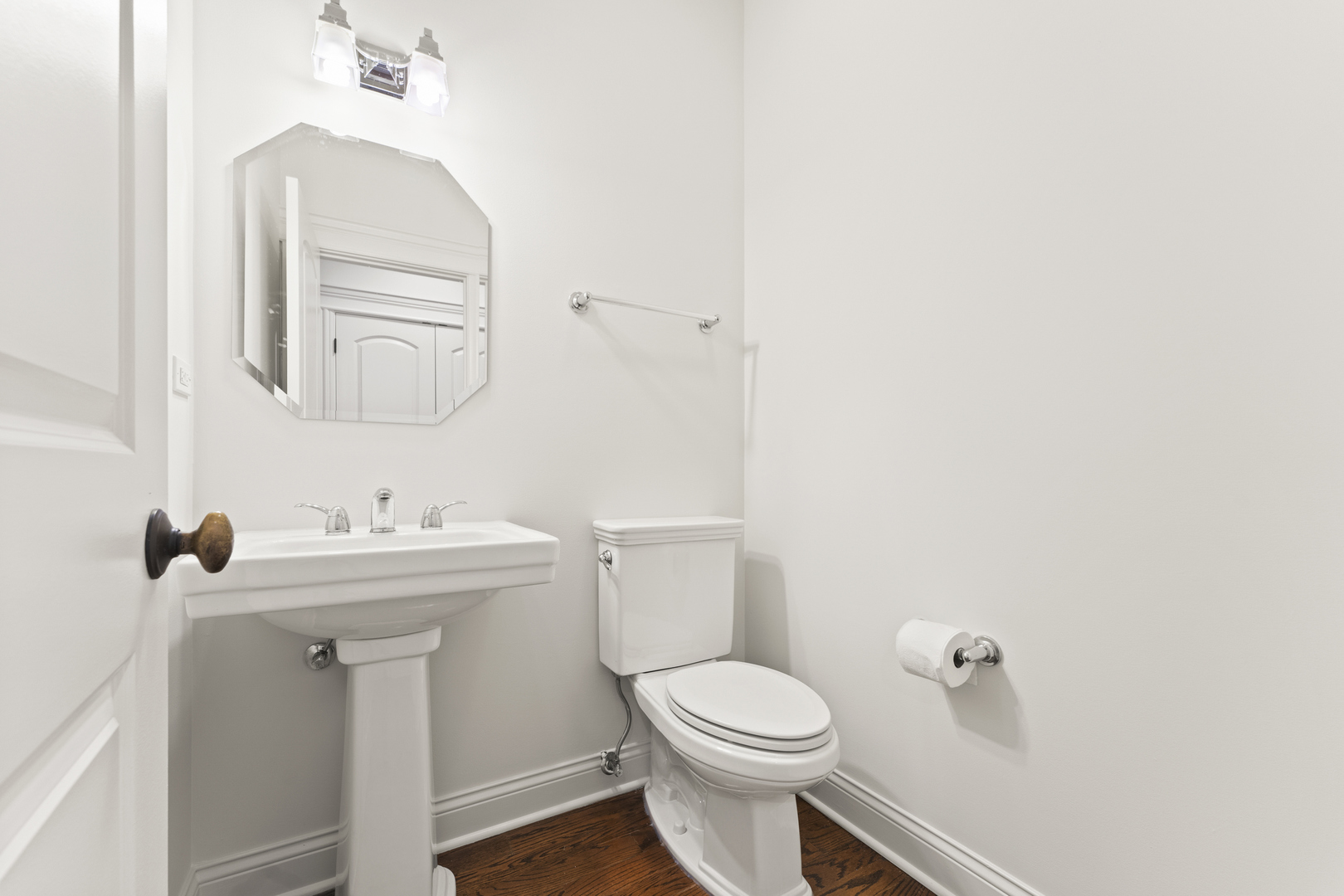 3716 North Kenmore Avenue, Unit 1 Chicago, IL 60613 - Photo 15 of 33 a bathroom with a toilet a sink and mirror