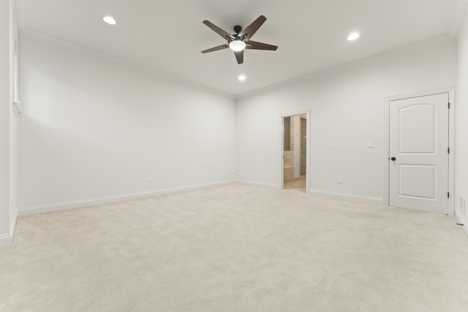 3716 North Kenmore Avenue, Unit 1 Chicago, IL 60613 - Photo 17 of 33 an empty room with a ceiling fan and window