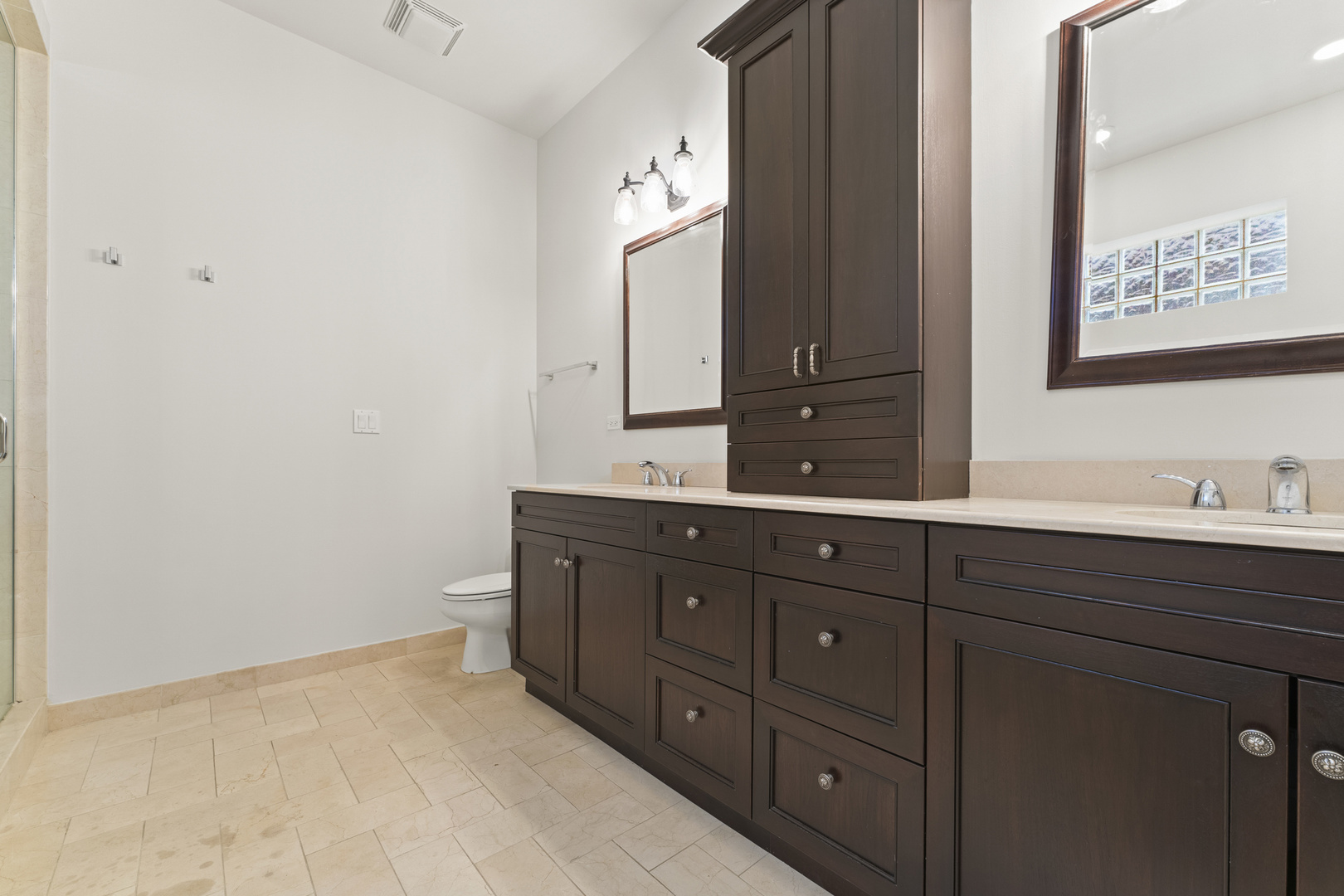 3716 North Kenmore Avenue, Unit 1 Chicago, IL 60613 - Photo 20 of 33 a bathroom with a sink and a mirror