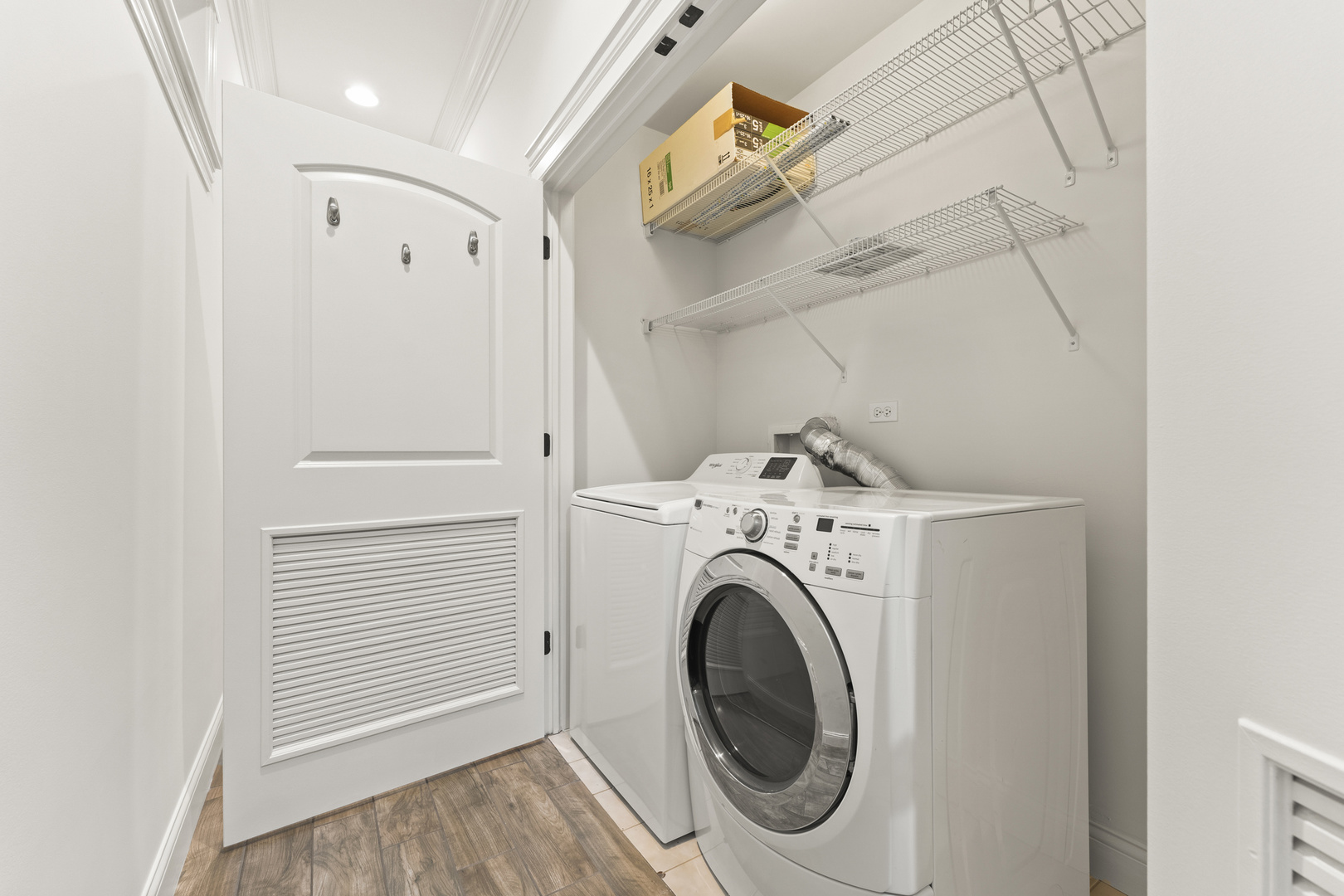 3716 North Kenmore Avenue, Unit 1 Chicago, IL 60613 - Photo 26 of 33 a view of entryway with washer and dryer