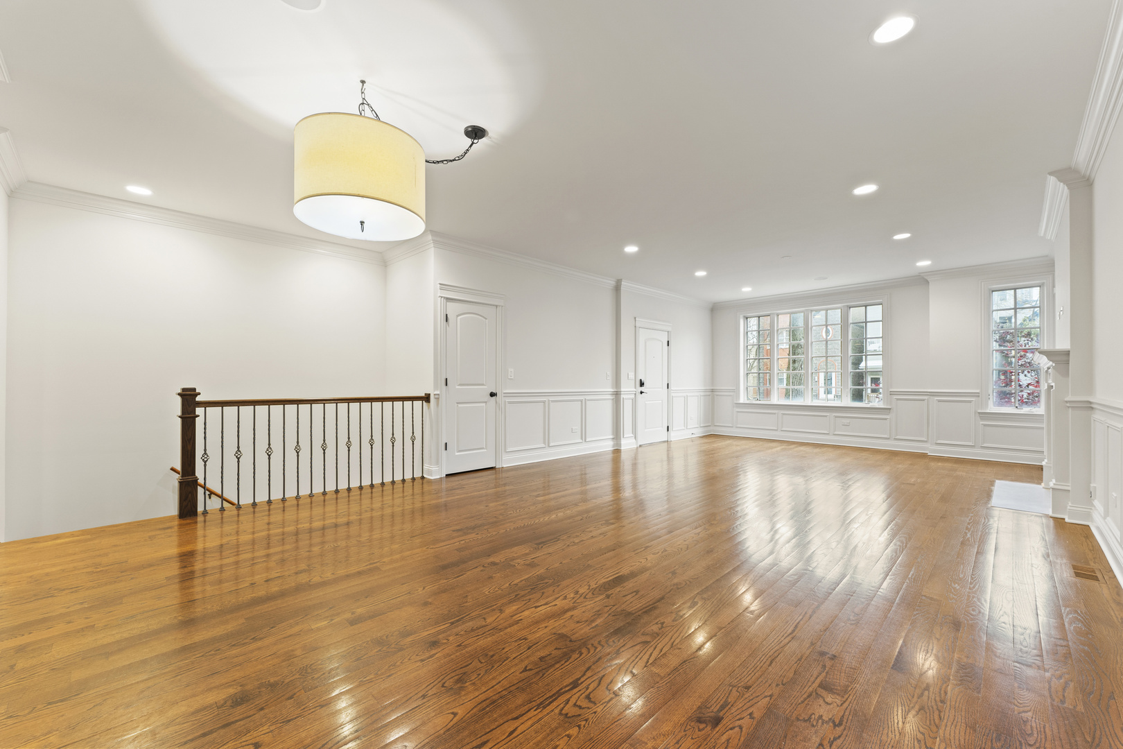 3716 North Kenmore Avenue, Unit 1 Chicago, IL 60613 - Photo 4 of 26 a view of an empty room and wooden floor
